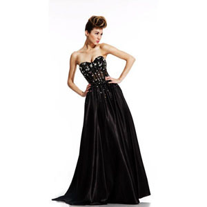 Including a gentle gathering at the waist this fully boned strapless A-line gown is a timeless beauty. The fully encrusted bodice with iridescent rock star crystals compliments the figure while still achieving perfect class.